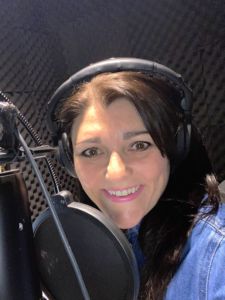 Tracy Heatley in the studio with her headphones on