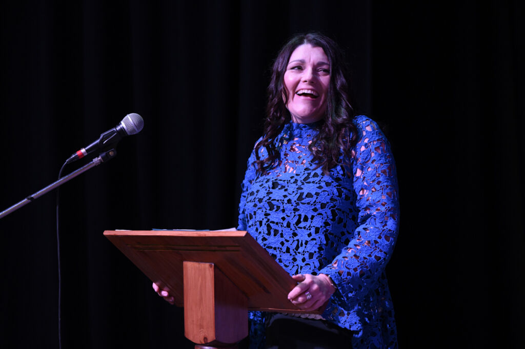 Tracy R Awards 22 Looking away laughing Tracy Heatley in action on stage as a speaker addressing the audience